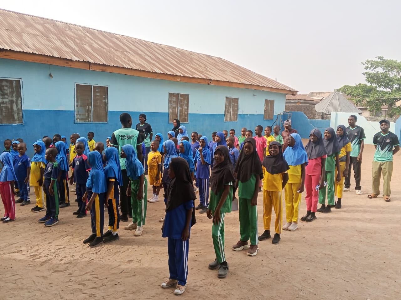 Morning assembly on the school grounds
