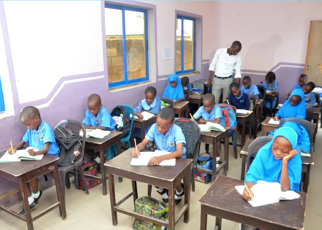 Teacher guiding students
